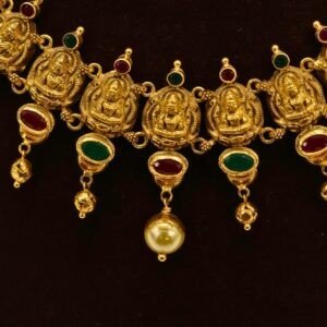 22KT Gold Lakshmi Necklace with Ruby & Green Stone Work (HUID Hallmarked) – Premium Bridal Collection (30.83g)