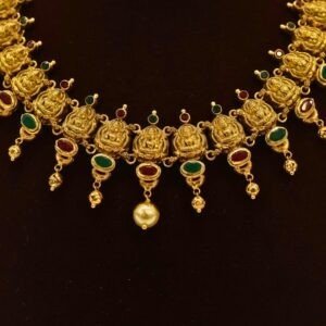 22KT Gold Lakshmi Necklace with Ruby & Green Stone Work (HUID Hallmarked) – Premium Bridal Collection (30.83g)