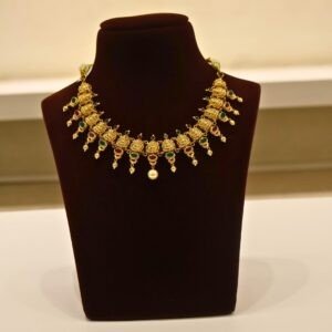 22KT Gold Lakshmi Necklace with Ruby & Green Stone Work (HUID Hallmarked) – Premium Bridal Collection (30.83g)