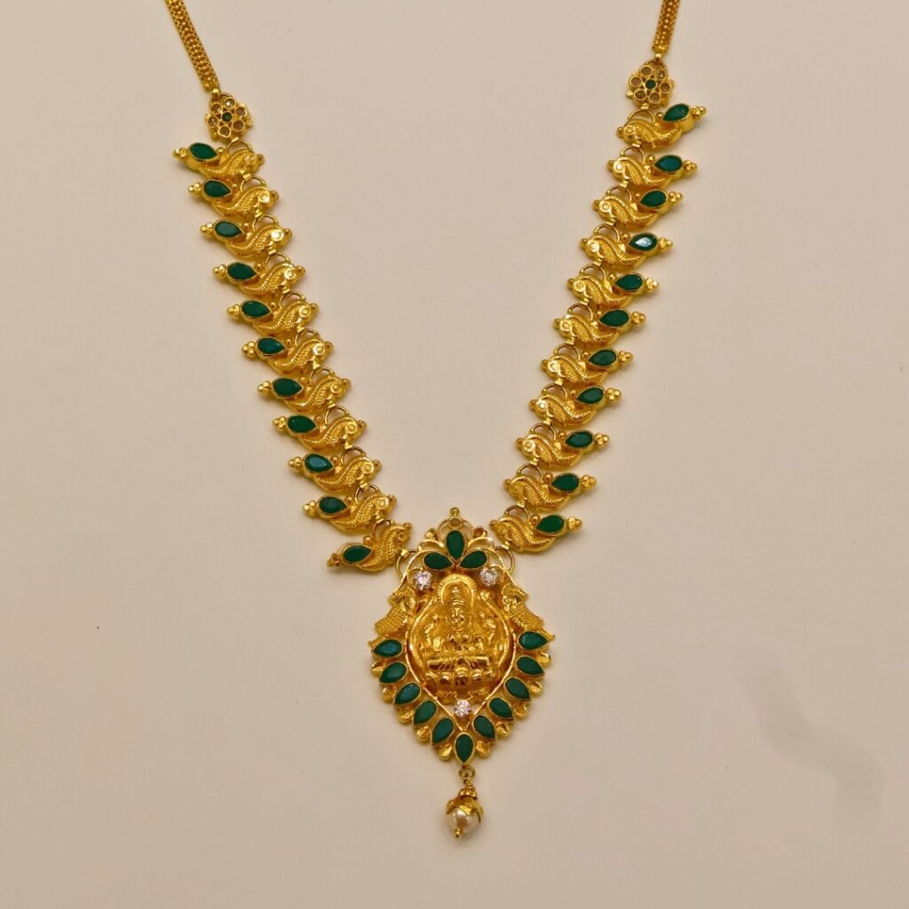 22KT Gold Lakshmi Necklace with Emerald Stone Work (HUID Hallmarked) – Traditional Bridal Collection (21.24g)